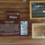 display about the planet Pluto in the Houlton Visitor Information Center, part of the Maine Solar System