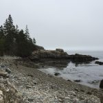 A rocky outcrop encloses a small bay along Schoodic Peninsula in Acadia National Park